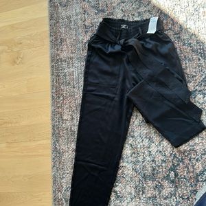 Brand new black satin pants.